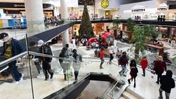 People at a shopping mall in Santa Anita, California on December 20, 2021. 