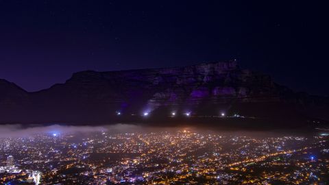 Table Mountain in Cape Town, South Africa, is lit up in purple on Sunday in memory of Desmond Tutu.