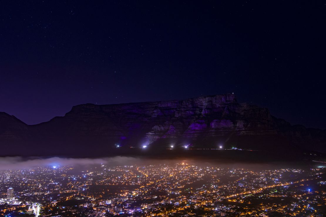 Table Mountain in Cape Town, South Africa, is lit up in purple on Sunday in memory of Desmond Tutu.