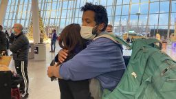 Fernando Espinoza hugs his mother Sara at JFK International Airport after his return to the US from Libya on December 27, 2021. source: Mickey Bergman / Richardson Center
