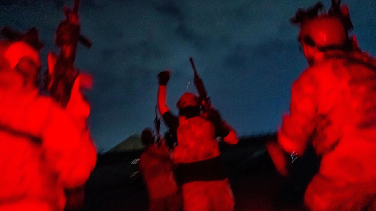 Taliban fighters storm the Kabul airport on August 31, 2021, after the US military completed its withdrawal from Afghanistan.