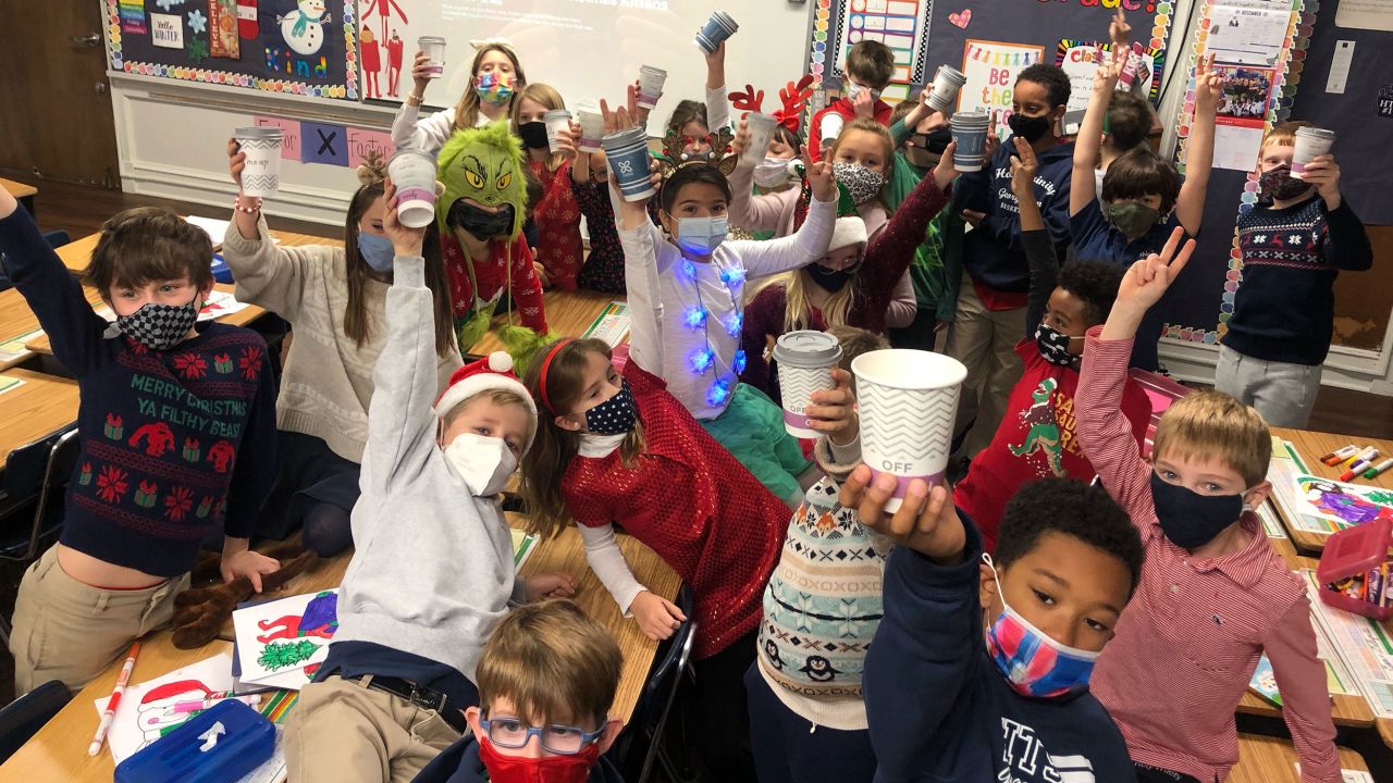 Ms. Fitz's third grade students enjoy their hot chocolate reward.