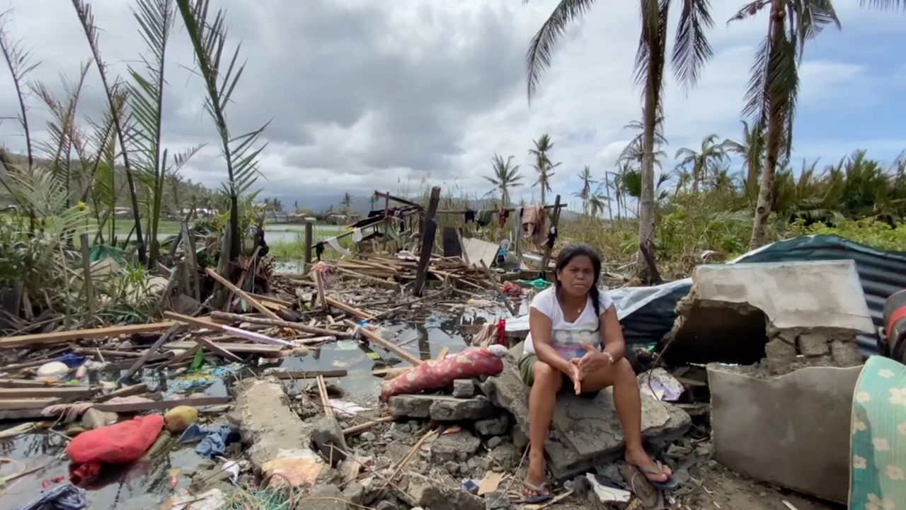 Jovelyn Paloma Sayson's home collapsed to rubble when Typhoon Rai hit. 