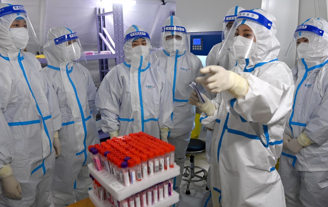 Medical workers at a testing lab in Xi'an on December 23.