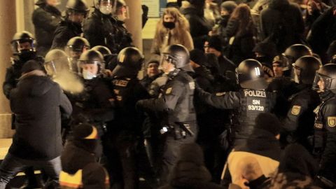 Protesters scuffle with police officers during a demonstration in Bautzen on Monday.