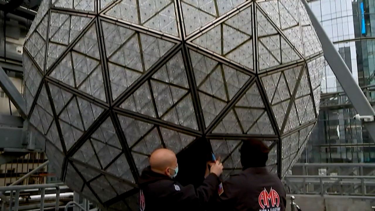 The Times Sqare ball measures 12 feet in diameter and weighs 11,875 pounds.