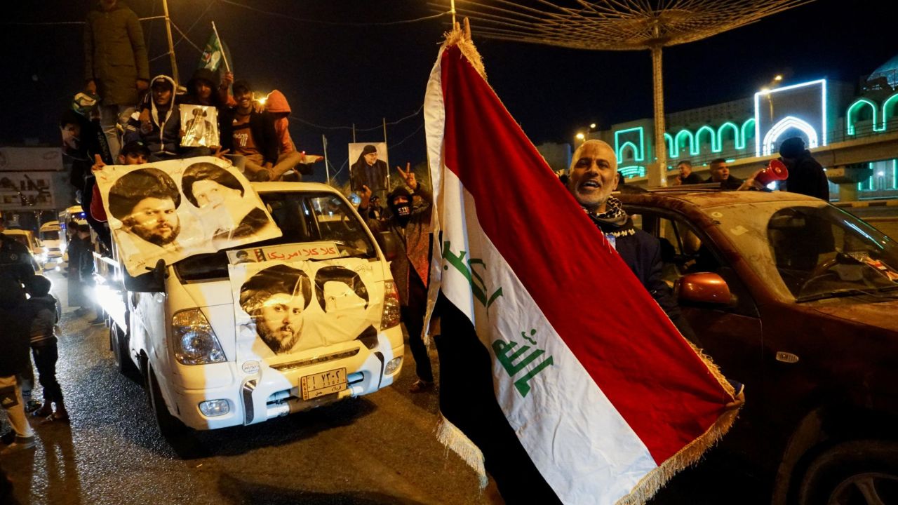Iraqi supporters of Sadr's movement celebrate after Iraq's Supreme Court ratified the results of parliamentary election, in Najaf, Iraq. 