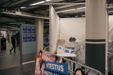 Medical workers in New York prepare Covid-19 tests at a testing site inside the Times Square subway station on December 27.