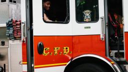 Members of the Cincinnati Fire Department (CFD) respond to a call at Greyhound station in Cincinnati, Ohio, U.S., on Thursday, July 16, 2020. Seventy percent of Cincinnati's revenue comes from taxes on wages, and with the coronavirus continuing to spread, leaving record joblessness in its wake, Mayor John Cranley said he fears permanent declines in essential services. Photographer: Andrew Cenci/Bloomberg via Getty Images