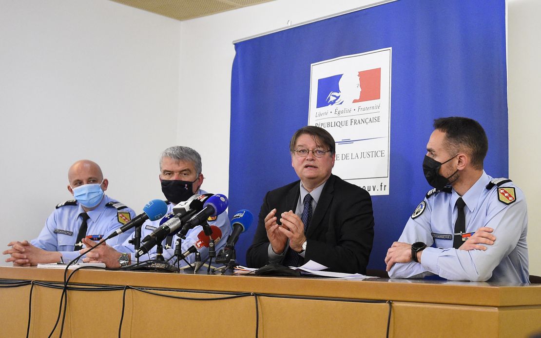 Public prosecutor François Perain (second right), flanked by other officials, speaks about the kidnapping of Mia in April 2021. 