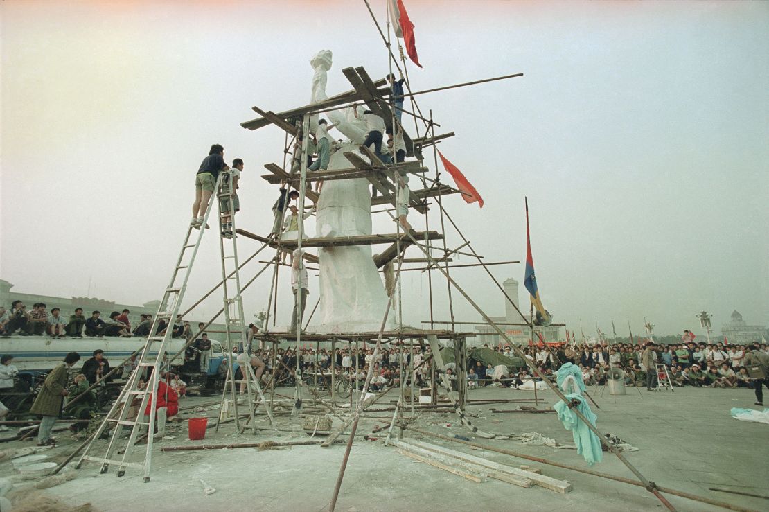 Beijing University students put the finishing touches on the Goddess of Democracy in Tiananmen Square in Beijing, May 30, 1989.