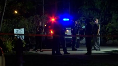 Deputies outside Naples Zoo in Florida after they say a tiger attacked a man who had entered an unauthorized area.