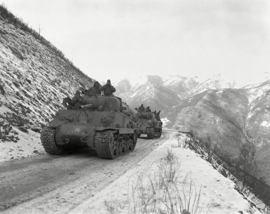 A US M-4A3 Sherman tank convoy travels along the Funchilin Pass in North Korea in 1950.