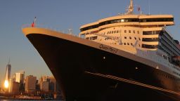 The Queen Mary 2 cruise ship by Cunard Line, owned by Carnival Corporation & plc. is seen docked at Brooklyn Cruise Terminal as the Omicron coronavirus variant continues to spread in Brooklyn, New York on December 20, 2021. 