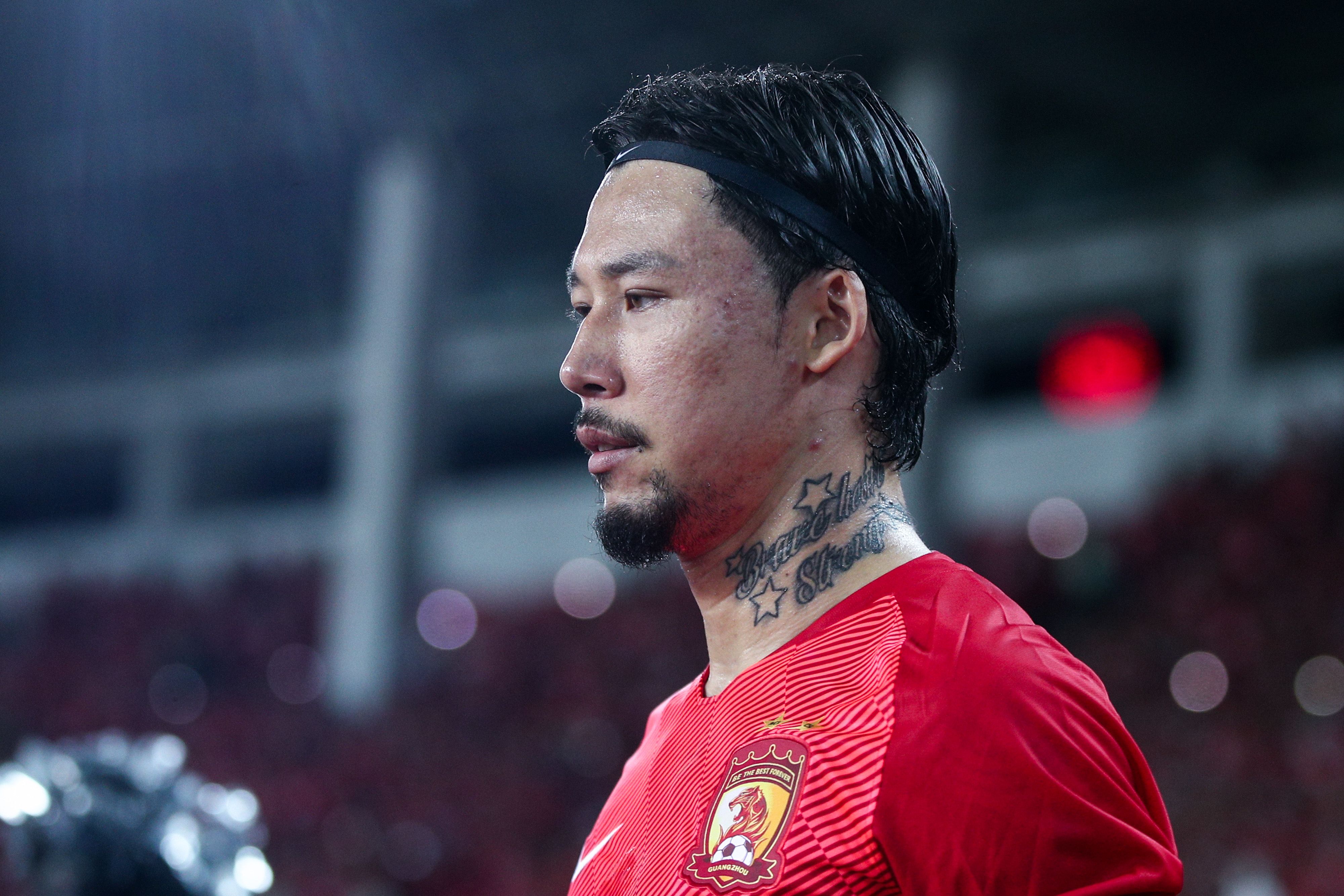 China bans footballers from getting tattoos | CNN