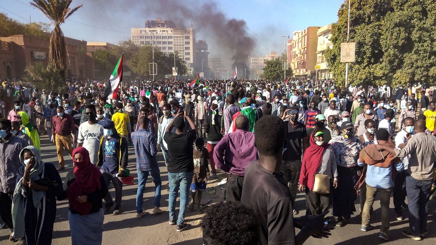 Sudanese protesters demonstrating against the military coup gather near the presidential palace in Khartoum on Thursday.