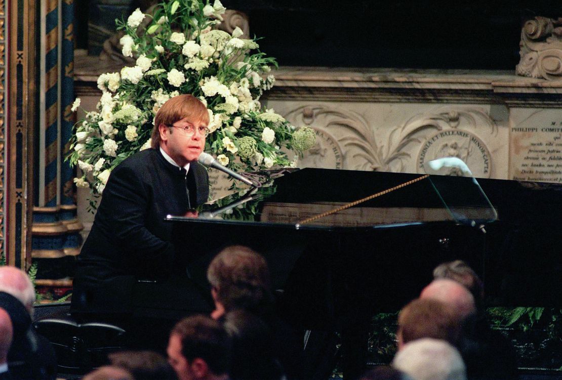 Elton John pictured singing at the funeral of Princess Diana on September 6, 1997.