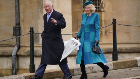 Charles and Camilla are seen making their way to the Christmas Day morning church service at St. George's Chapel.