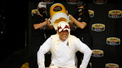Head coach Shane Beamer of the South Carolina Gamecocks is covered in Duke's Mayonnaise following his team's 38-21 victory over the North Carolina Tar Heels. 
