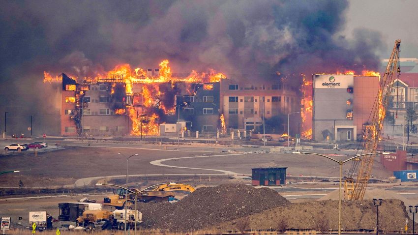 In the old town area of Superior, Colorado, multiple buildings and vehicles are on fire, including an Element  hotel, Thursday, December 30, 2021.