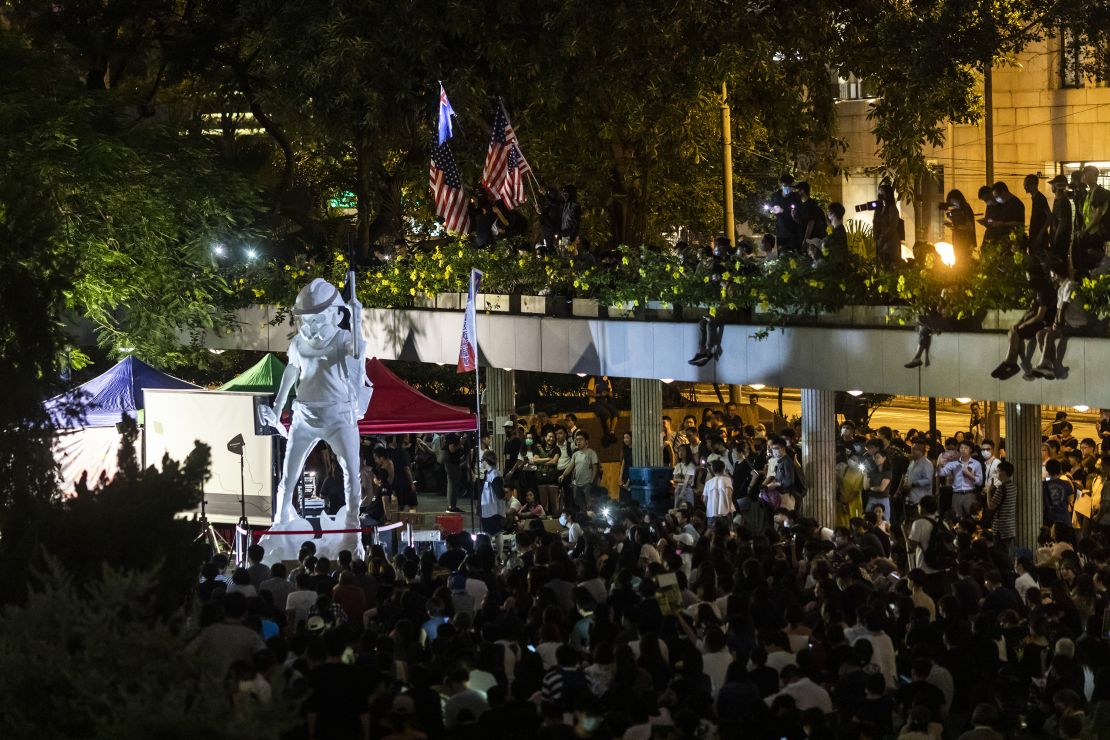 Demonstrators gather around the Lady Liberty Hong Kong statue during a rally in the Central district of Hong Kong in September 2019. 