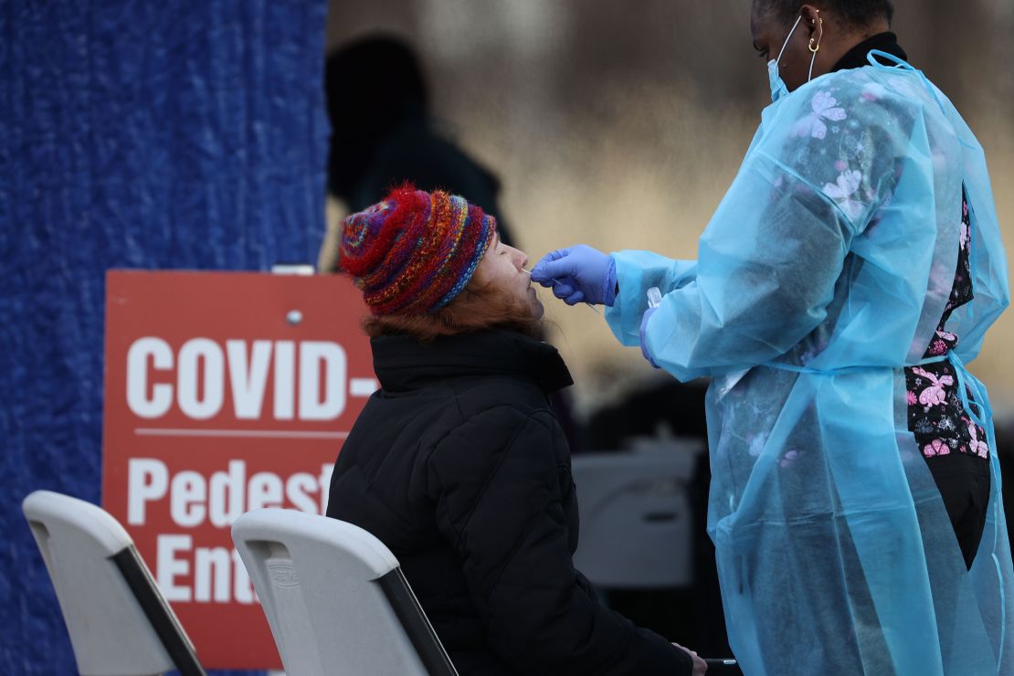 A woman gets a Covid-19 test at a drive-through testing center in North Bergen, New Jersey, last week.