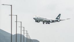 A Cathay Pacific cargo airplane prepares to land at Hong Kong International Airport on November 21, 2021. (Photo by Bertha WANG / AFP) (Photo by BERTHA WANG/AFP via Getty Images)