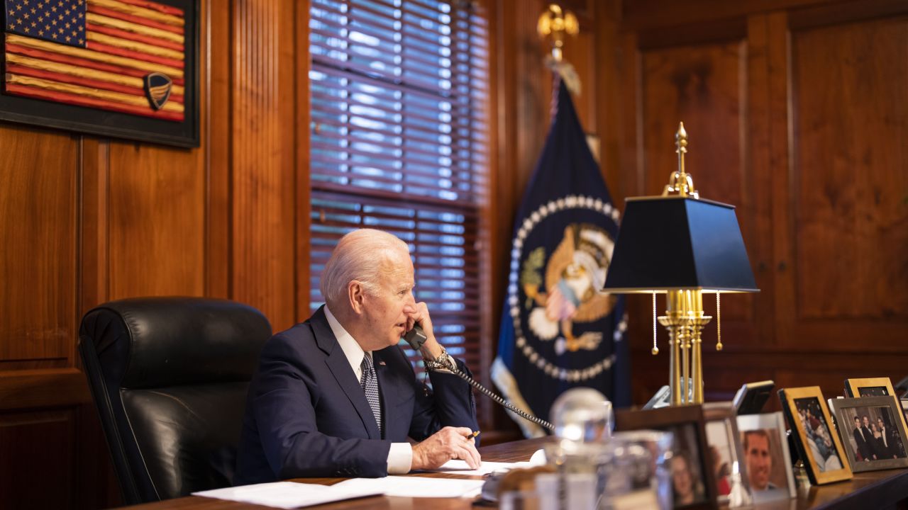 In this image provided by The White House, President Joe Biden speaks with Russian President Vladimir Putin on the phone from his private residence in Wilmington, Del., Thursday, Dec. 30, 2021. 