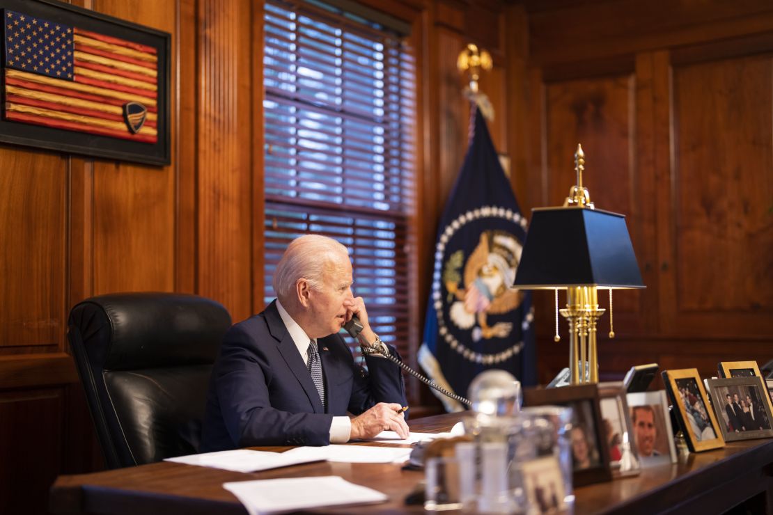 In this image provided by The White House, President Joe Biden speaks with Russian President Vladimir Putin on the phone from his private residence in Wilmington, Del., Thursday, Dec. 30, 2021. 