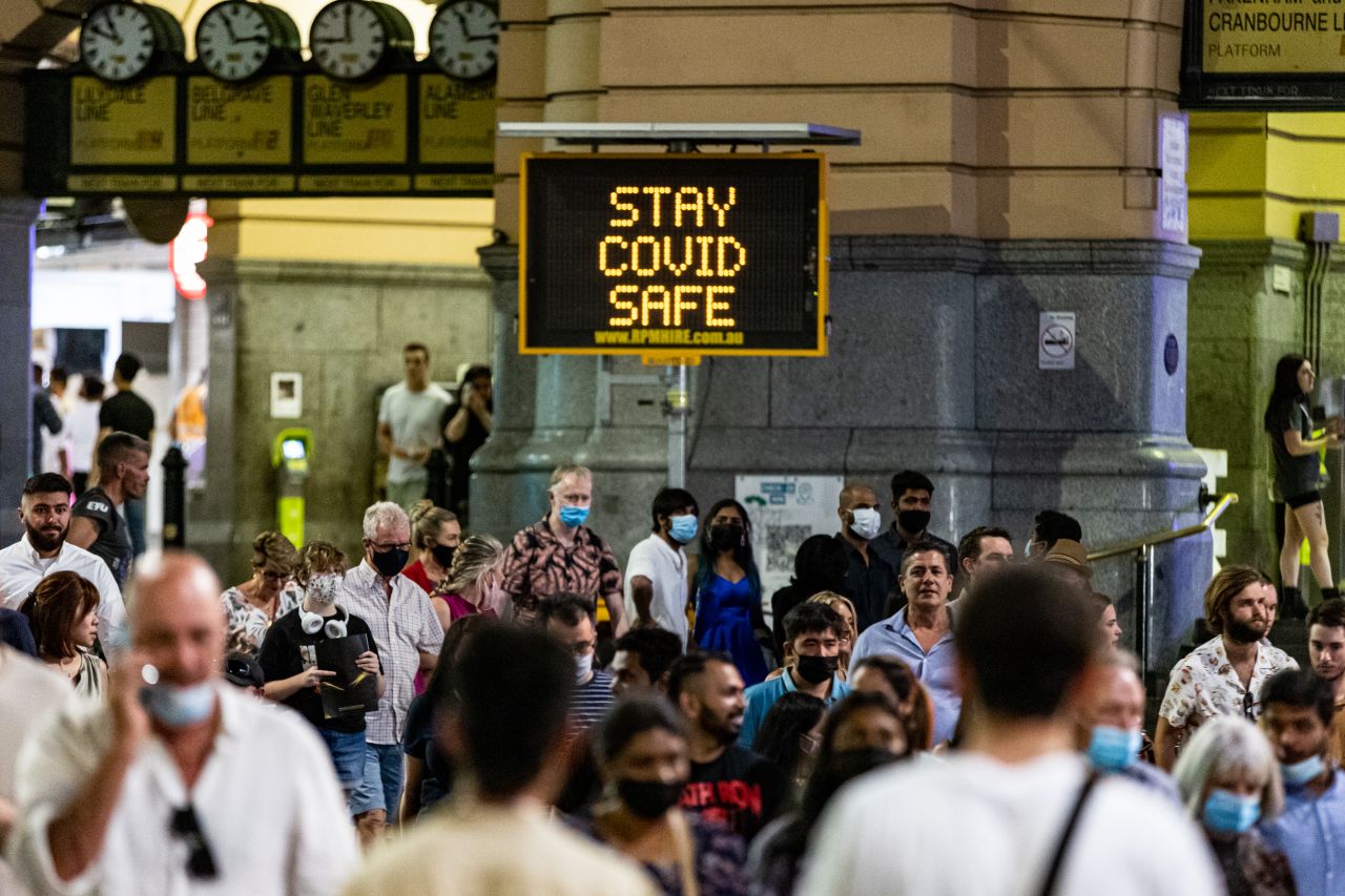 A sign urges revelers to "stay Covid safe" in Melbourne, Australia.