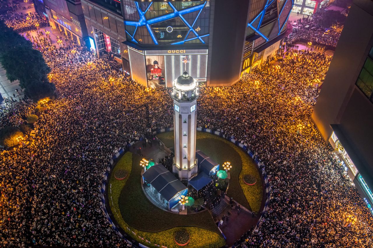 People gather to welcome the new year in Chongqing, China.