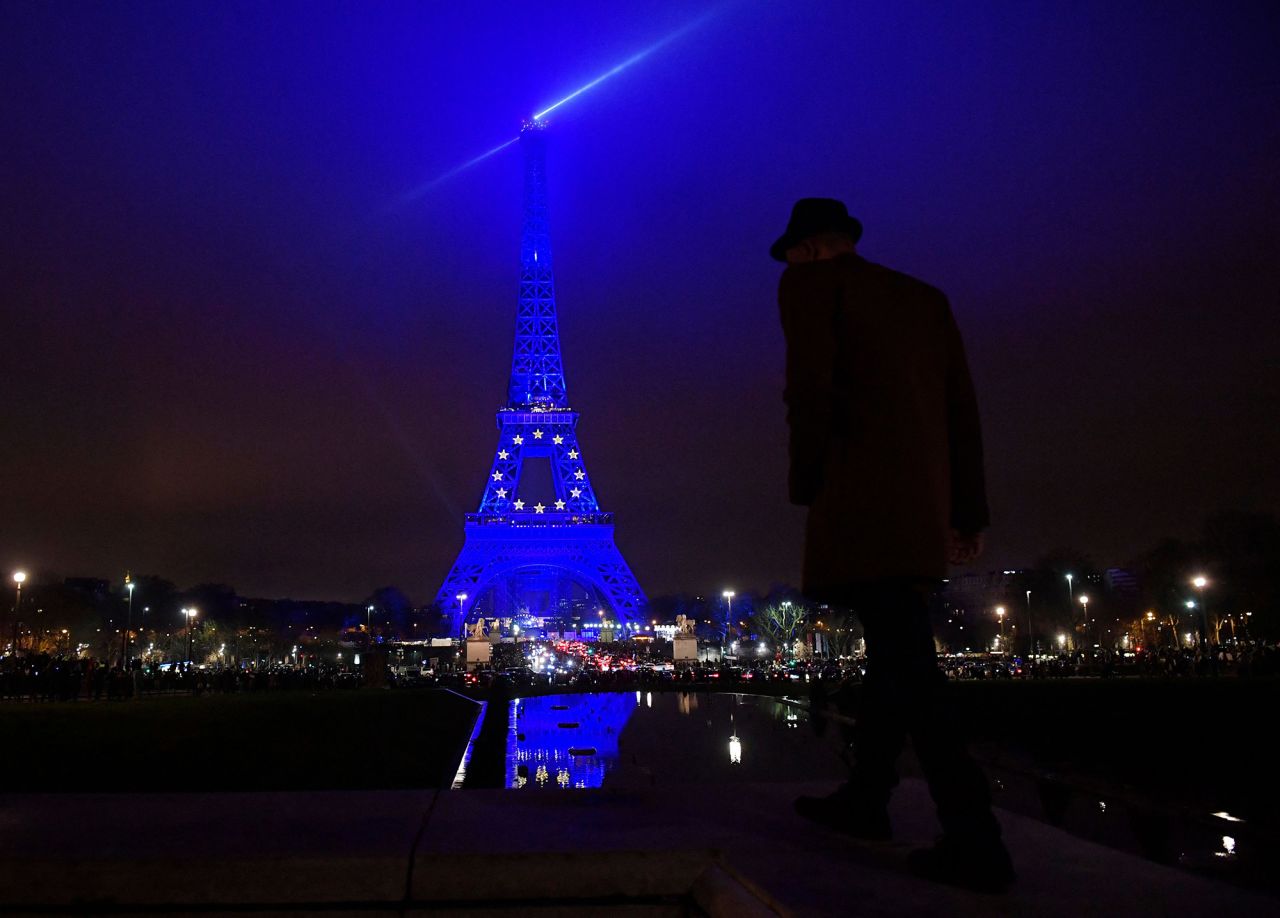 The Eiffel Tower in Paris is lit up blue to mark the start of the French presidency of the European Union.
