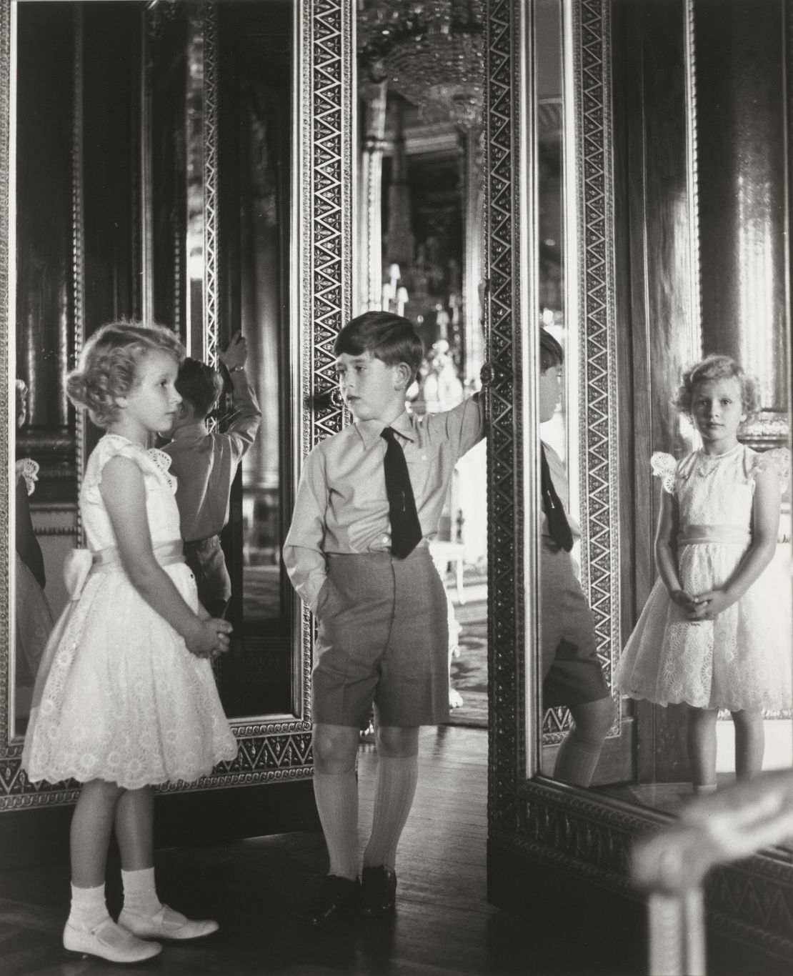 The current king as a child alongside his younger sister Princess Anne in 1956.