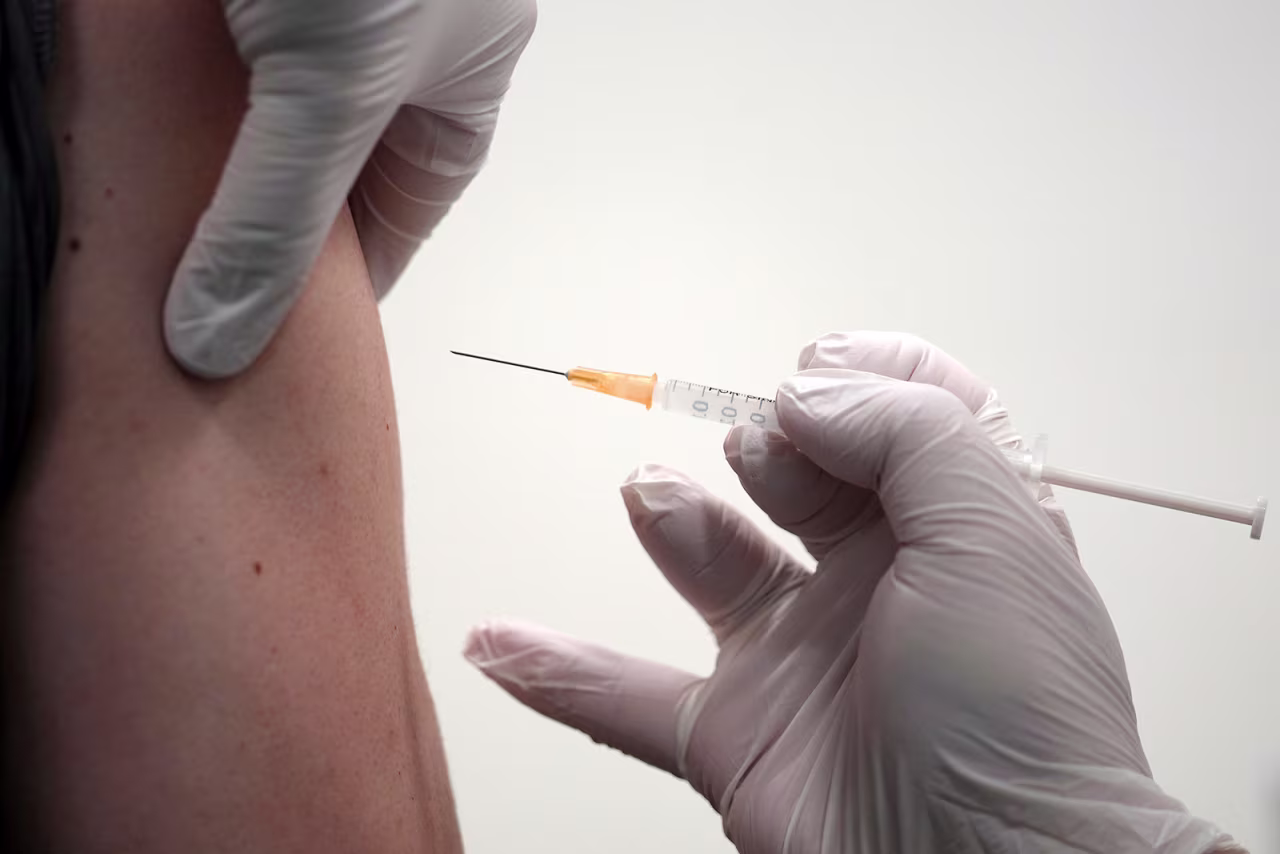 A local resident receives the Moderna Covid-19 vaccine shot at a center on Wednesday, June 30, in the Sumida ward of Tokyo.