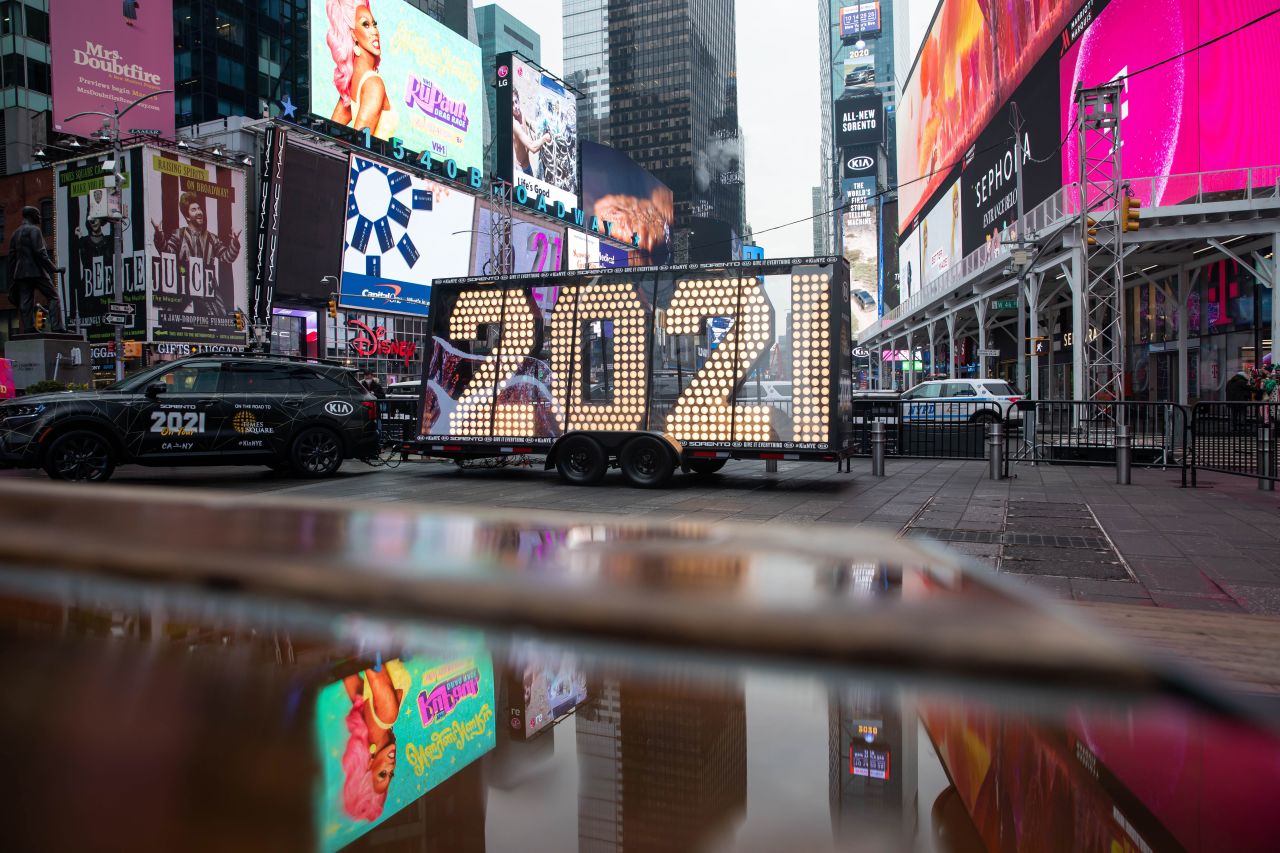 An SUV delivers the "2021" New Year's Eve numerals to Times Square in New York during a coast-to-coast tour on December 21.