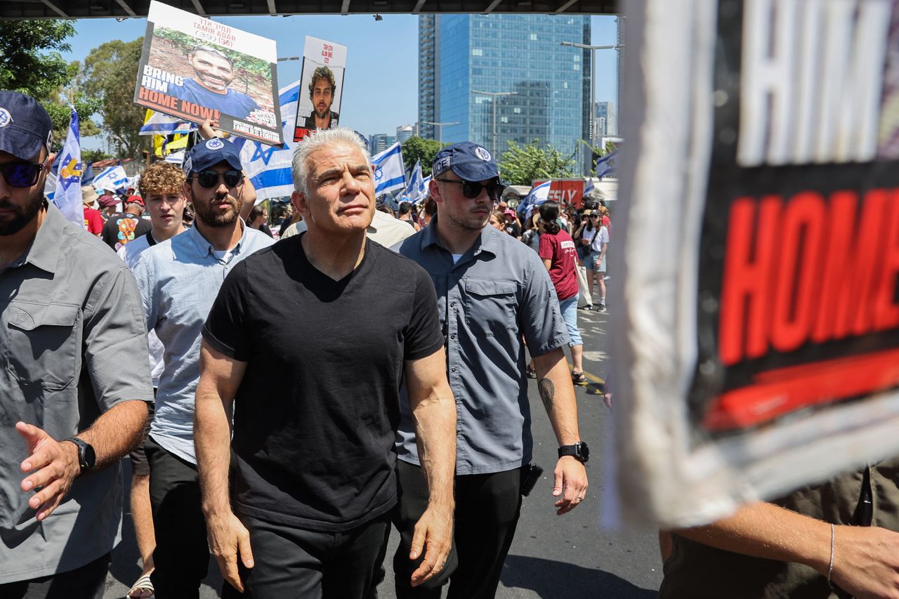 Israeli opposition leader Yair Lapid attends a rally by families and supporters of hostages held in the Gaza Strip in Tel Aviv, Israel, on September 2.