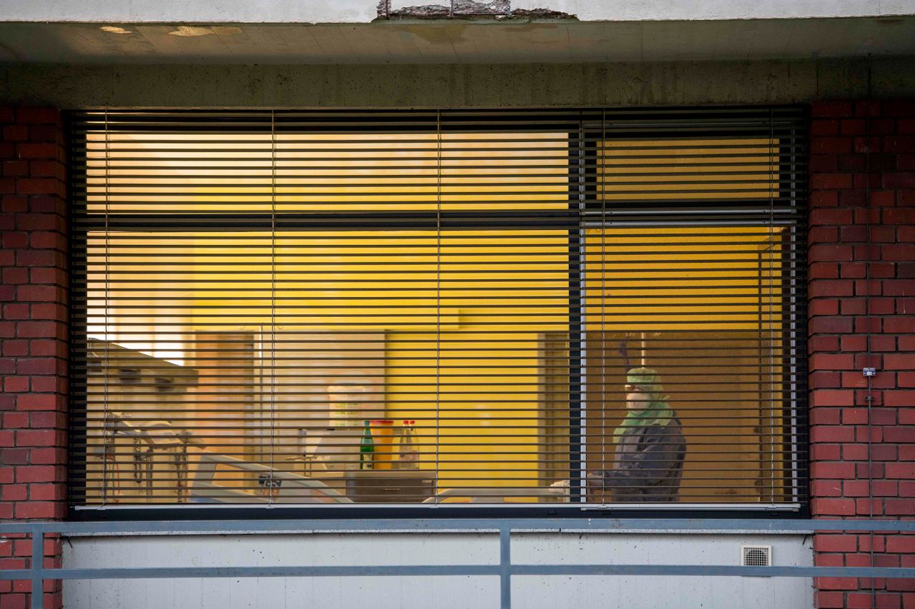 Medical staff clean a hospital room in the isolation unit of the Frankfurt Goethe University Hospital in western Germany on February 2.