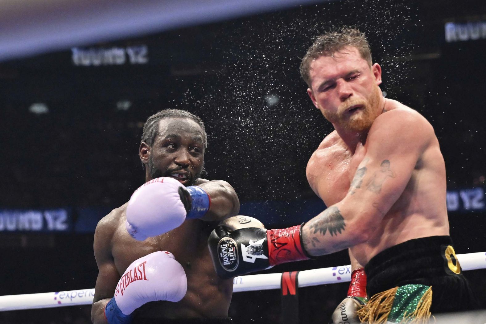Terence “Bud” Crawford punches Saúl “Canelo” Álvarez during their super-middleweight title fight in Las Vegas on Saturday, September 13. Crawford became the first male boxer to capture three unified division titles when <a href="index.php?page=&url=https%3A%2F%2Fwww.cnn.com%2F2025%2F09%2F14%2Fsport%2Fcrawford-defeats-alvarez-boxing-hnk">he defeated Álvarez by unanimous decision</a>.