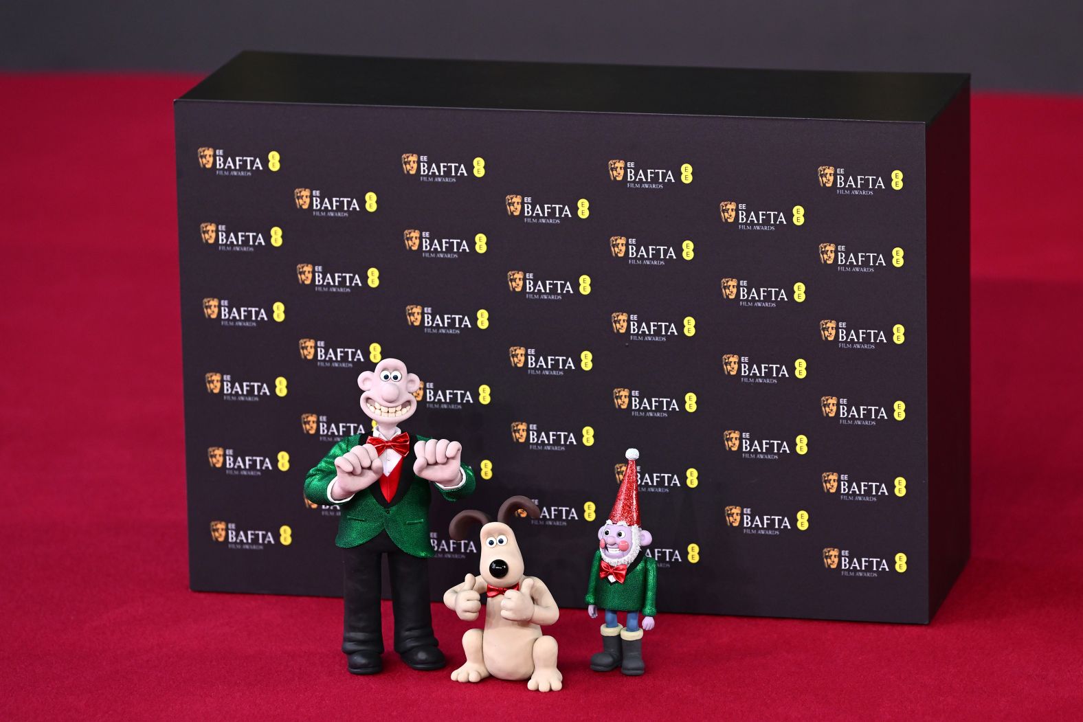 “Wallace & Gromit” figurines are placed on the red carpet at the <a href="https://www.cnn.com/2025/02/16/entertainment/bafta-film-awards-2025-winners/index.html">BAFTA Film Awards</a> in London on Sunday, February 16. The latest film in the franchise, “Wallace & Gromit: Vengeance Most Fowl,” won best children’s and family film.