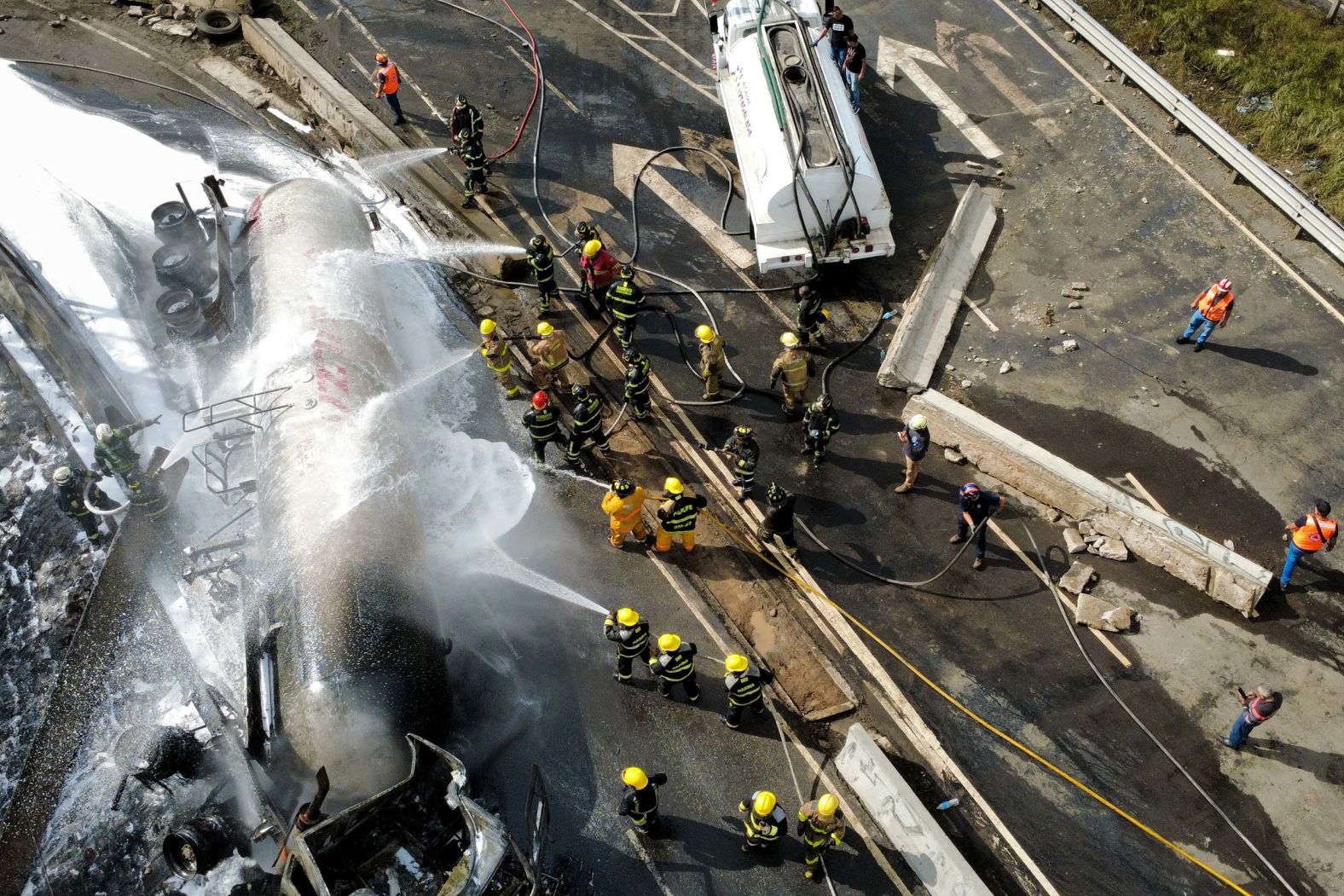 Firefighters respond to the scene of a <a href="index.php?page=&url=https%3A%2F%2Fwww.cnn.com%2F2025%2F09%2F10%2Famericas%2Fmexico-gas-tanker-explosion-latam-intl">gas truck explosion</a> in Mexico City on Wednesday, September 10. At least six people were killed and 90 were injured, according to the city’s government. Authorities said the explosion occurred after the vehicle overturned by a highway in the Puente de la Concordia area.