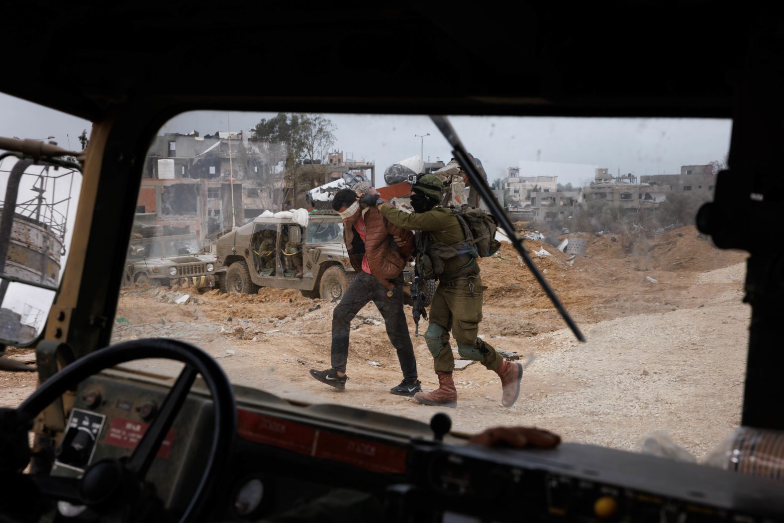 Israeli troops arrest a suspected Hamas soldier in eastern Gaza on November 22. “I’ve been a journalist for over 30 years, since the first Intifada in 1987,” photographer Ziv Koren said. “I’ve covered war and conflict and natural diseases. I’ve traveled to Haiti to the Far East, from Africa to Ukraine. I’ve covered stories on terrorism. But nobody could expect this kind of event, this magnitude of loss on October 7.”