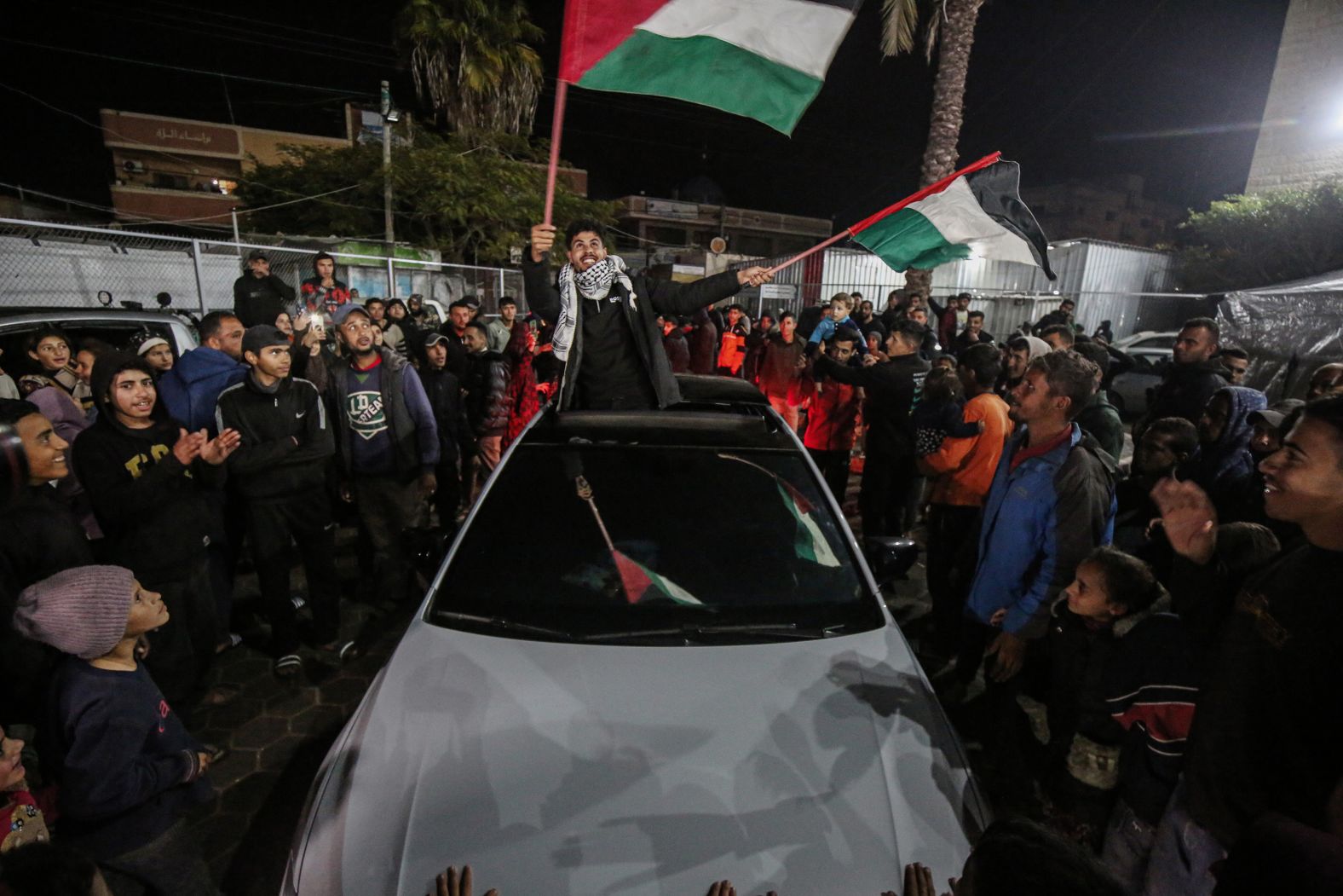 Palestinians in Deir al-Balah, Gaza, react to the news of a <a href="index.php?page=&url=https%3A%2F%2Fwww.cnn.com%2F2025%2F01%2F15%2Fus%2Fwhats-in-the-hamas-israel-ceasefire-and-hostage-release-deal%2Findex.html">ceasefire agreement between Hamas and Israel</a> on Wednesday, January 15. The deal would deliver Gaza’s first reprieve from war in more than a year.