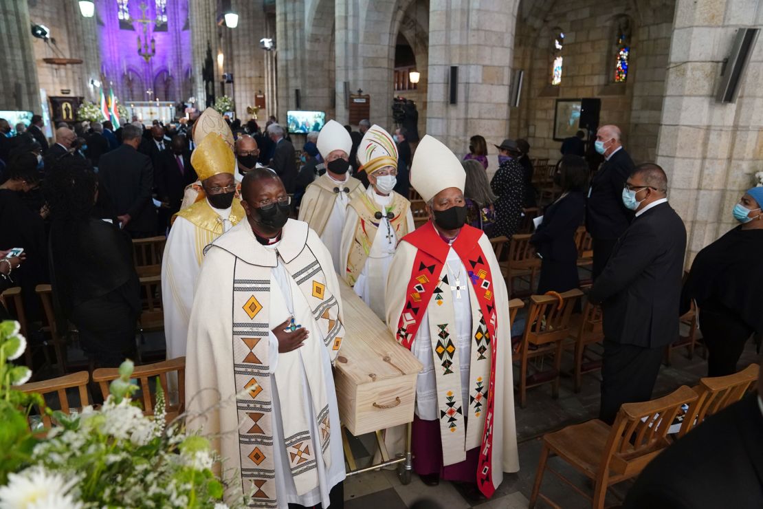 Tutu's coffin is carried out of St. George's Cathedral in Cape Town at the end of his funeral service on Saturday. 