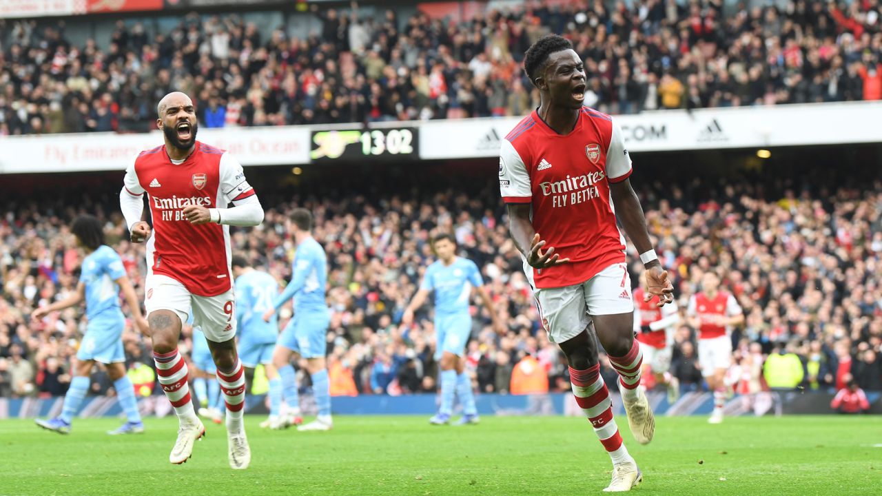 Bukayo Saka celebrates after giving Arsenal the lead against Manchester City.