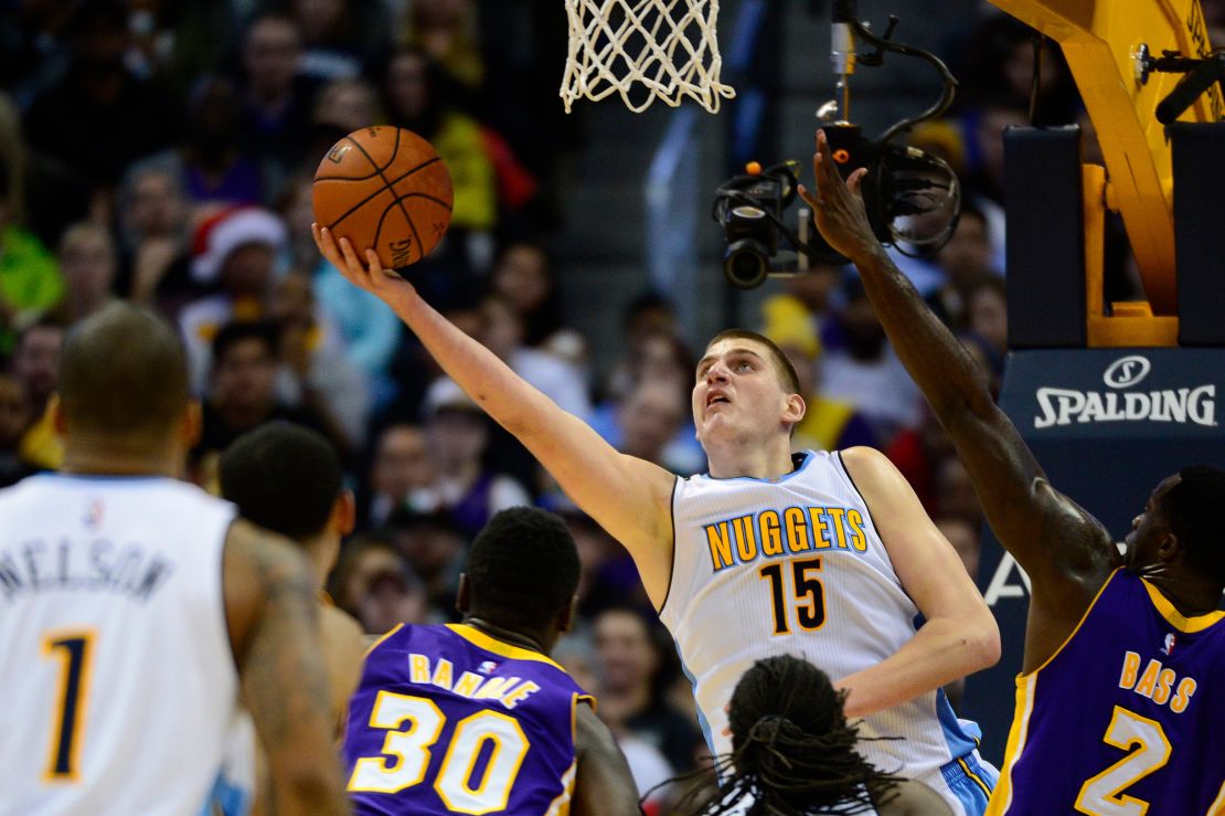 Nikola Jokic (15) of the Denver Nuggets puts up a layup up during the fourth quarter at the Pepsi Center on December 22, 2015 in Denver, Colorado. The Lakers defeated the Nuggets 111-107.