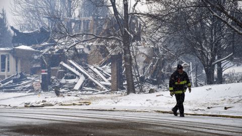 A destroyed home is covered in snow in Louisville, Colorado, on Friday, December 31, 2021. 
