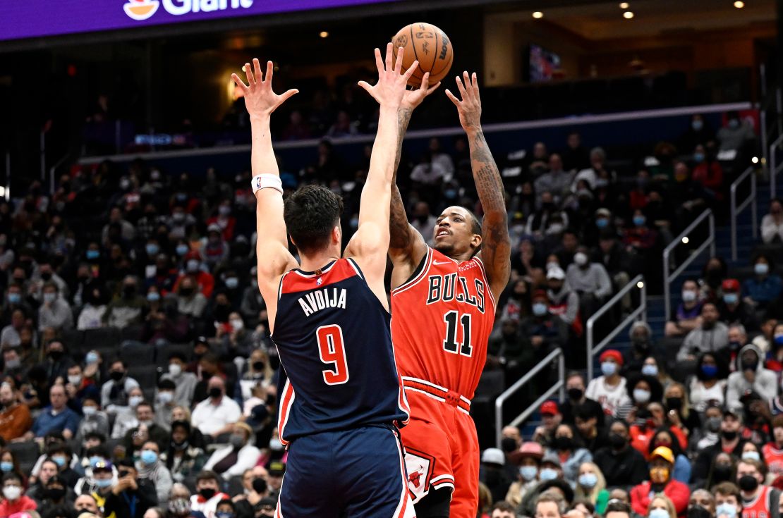 DeMar DeRozan #11 of the Chicago Bulls shoots the ball in the second half against Deni Avdija #9 of the Washington Wizards at Capital One Arena on January 01, 2022 in Washington, DC. 