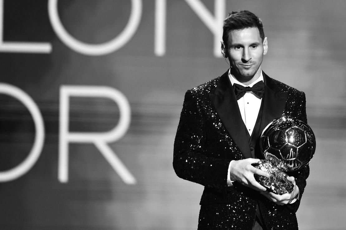 Lionel Messi shows off his seventh Ballon D'Or trophy at the Theatre du Chatelet on November 29, 2021 in Paris, France.