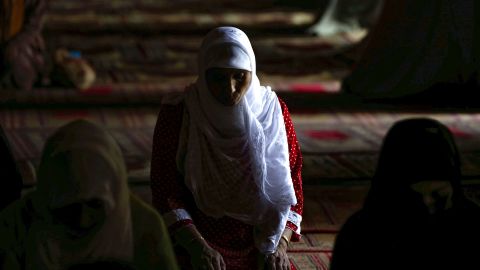 Kashmiri Muslim women offer Friday prayers at Jamia Masjid, the grand mosque of Srinagar, the summer capital of Indian Kashmir.
