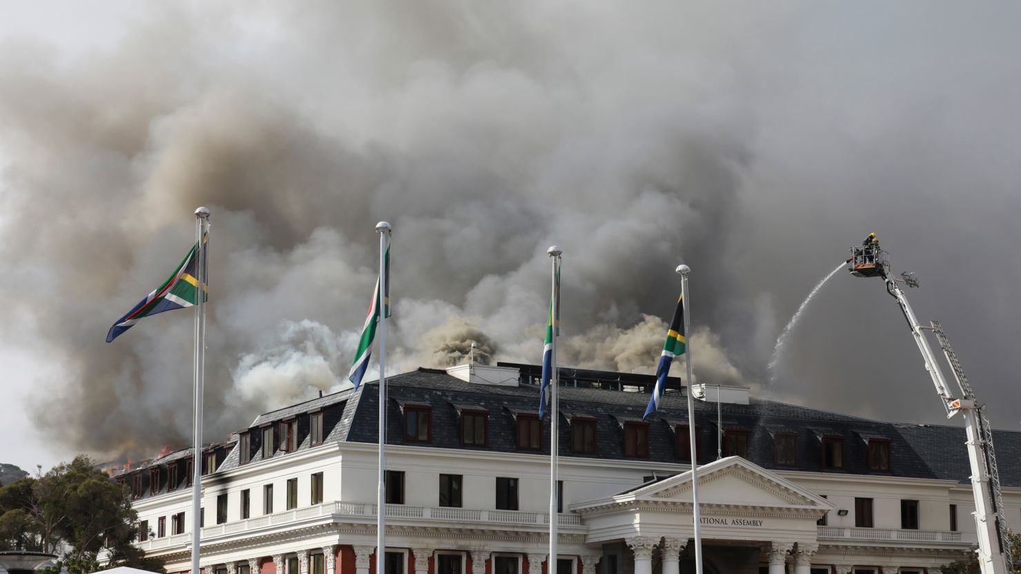 Smoke rises from the Parliament in Cape Town, South Africa, Monday, Jan 3, 2022 after the fire re-ignited late afternoon. 